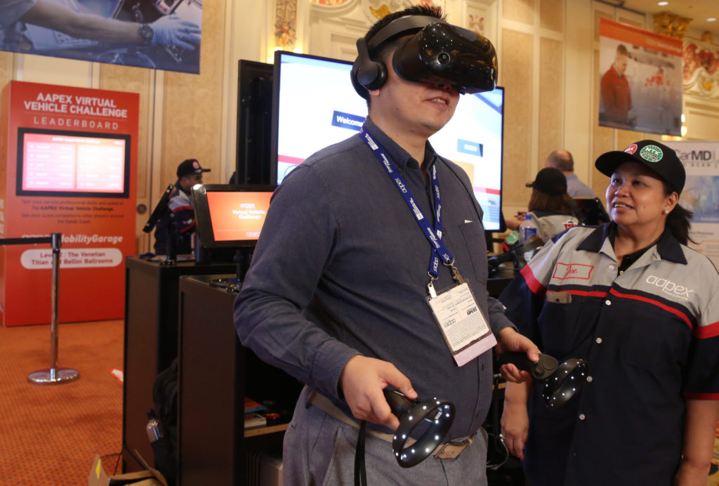 In a friendly competition at AAPEX 2019, attendees are invited to virtually install parts on a vehicle and compete for the best time during the Virtual Vehicle Challenge.